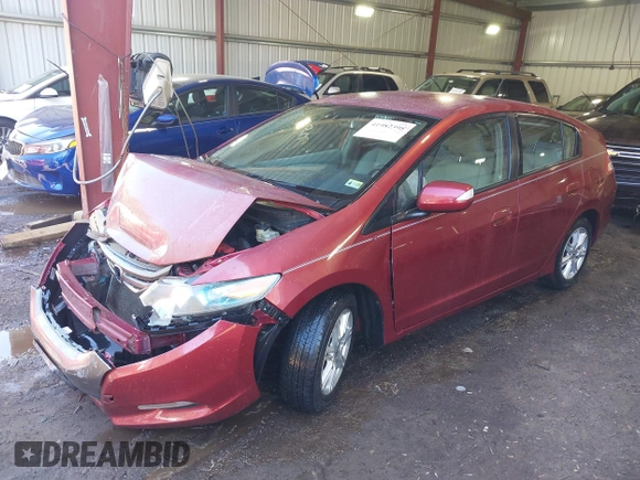 2010 Honda Insight EX z VIN JHMZE2H7XAS001280, wystawiony jako IAAI lot #41982398 z przebiegiem 142 434 mil mil oraz . Historia ofert i sprzedaży dostępna na DreamBid. Obrazek 17.