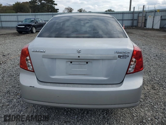 2006 Suzuki Forenza z VIN KL5JD56Z96K362651, wystawiony jako Copart lot #78306894 z przebiegiem 167 916 mil mil oraz Tytuł czysty. Historia ofert i sprzedaży dostępna na DreamBid. Obrazek 6.
