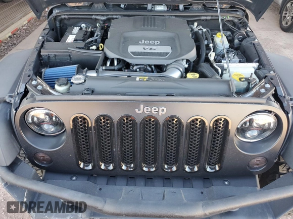 2017 Jeep Wrangler Sport with VIN 1C4AJWAG5HL662456, listed as a Copart auction lot 50166505 with 61,249 mi miles and Salvage Title. Bid and sale history available at DreamBid. Image 12.