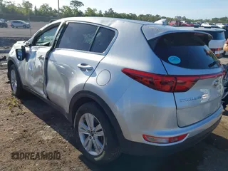 2019 Kia Sportage LX with VIN KNDPM3AC8K7591055, listed as a IAAI auction lot 41962190 with 74,003 mi miles. Bid and sale history available at carsss.com. Image 3.