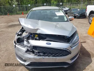 2016 Ford Focus SE with VIN 1FADP3F23GL373801, listed as a IAAI auction lot 42083360 with 52,993 mi miles and . Bid and sale history available at DreamBid. Image 12.