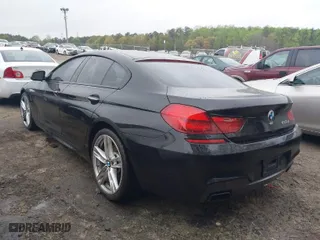 2014 BMW 6 Series 650i with VIN WBA6B2C55ED129162, listed as a IAAI auction lot 41917771 with 100,452 mi miles. Bid and sale history available at carsss.com. Image 3.