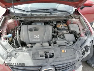 2016 Mazda CX-5 Grand Touring with VIN JM3KE4DY0G0820954, listed as a Copart auction lot 48027785 with 152,448 mi miles and Salvage Title. Bid and sale history available at carsss.com. Image 14.