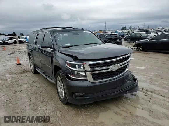 2015 Chevrolet Suburban LT with VIN 1GNSCJKC1FR159411, listed as a Copart auction lot 52169465 with 145,511 mi miles and Salvage title. Bid and sale history available at DreamBid. Image 11.