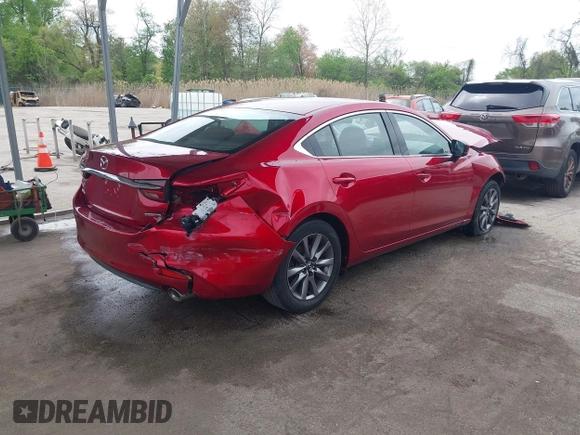 2020 Mazda 6 Sport with VIN JM1GL1UM9L1526019, listed as a IAAI auction lot 42092321 with 73,660 mi miles and . Bid and sale history available at DreamBid. Image 4.