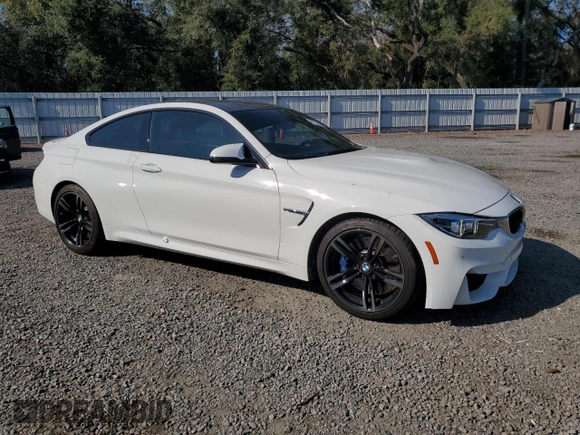 2019 BMW M4 with VIN WBS4Y9C51KAG67058, listed as a Copart auction lot 81354064 with 63,350 mi miles and Salvage Title. Bid and sale history available at carsss.com. Image 4.
