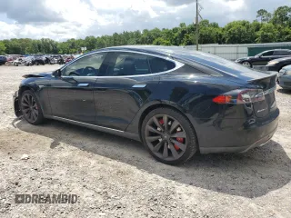 2013 Tesla Model S Performance с VIN 5YJSA1CP8DFP20786, выставлен на аукционе Copart как лот 61035395 с пробегом 140 119 миль миль и Списание • Salvage title. История ставок и продаж доступна на DreamBid. Изображение 2.
