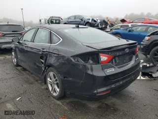 2015 Ford Fusion Energi Titanium with VIN 3FA6P0SU1FR175569, listed as a Copart auction lot 65519992 with 103,072 mi miles. Bid and sale history available at carsss.com. Image 3.