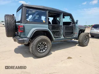 2024 Jeep Wrangler Rubicon X with VIN 1C4RJXFGXRW247781, listed as a Copart auction lot 64393745 with 2,661 mi miles and Salvage title. Bid and sale history available at DreamBid. Image 3.