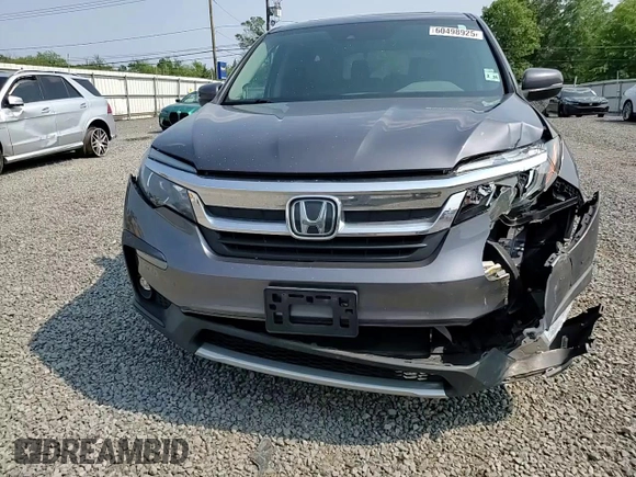 2019 Honda Pilot EX-L with VIN 5FNYF6H54KB052448, listed as a Copart auction lot 60498925 with 146,113 mi miles and Salvage title. Bid and sale history available at DreamBid. Image 14.
