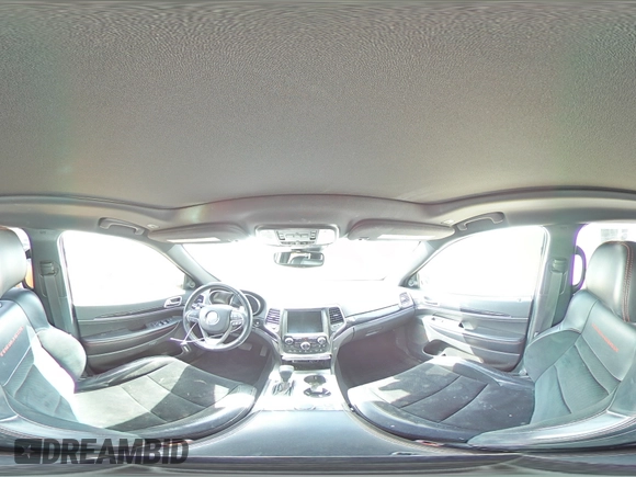 2017 Jeep Grand Cherokee Trailhawk with VIN 1C4RJFLGXHC654112, listed as a Copart auction lot 56397195 with 168,136 mi miles and Salvage title. Bid and sale history available at DreamBid. Image 16.