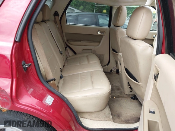 2010 Ford Escape Limited z VIN 1FMCU0EG5AKC21828, wystawiony jako IAAI lot #42343582 z przebiegiem 135 534 mil mil oraz . Historia ofert i sprzedaży dostępna na DreamBid. Obrazek 8.