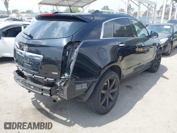 2014 Cadillac SRX Luxury Collection with VIN 3GYFNBE34ES639647, listed as a IAAI auction lot 42108140 with 99,740 mi miles and . Bid and sale history available at DreamBid. Image 4.