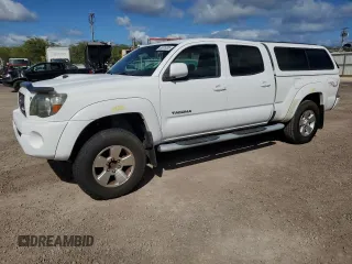 2010 Toyota Tacoma PreRunner with VIN 3TMKU4HN0AM024818, listed as a Copart auction lot 55816305 with 111,527 mi miles and Salvage title. Bid and sale history available at DreamBid. Image 1.