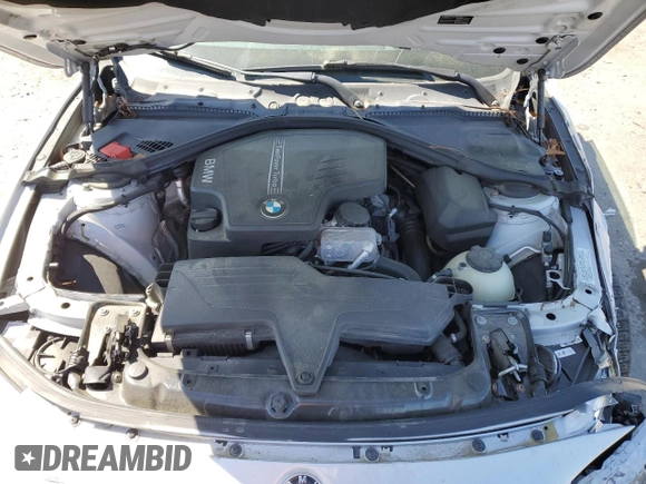 2014 BMW 4 Series 428i xDrive with VIN WBA3N5C51EF716572, listed as a Copart auction lot 52086365 with 209,742 mi miles and Salvage Title. Bid and sale history available at DreamBid. Image 12.