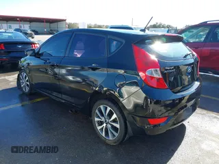 2015 Hyundai Accent Sport with VIN KMHCU5AE8FU233131, listed as a IAAI auction lot 41360461 with 99,480 mi miles. Bid and sale history available at carsss.com. Image 3.
