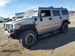 2005 Hummer H2 SUV with VIN 5GRGN23U85H113194, listed as a Copart auction lot 78012304 with 148,940 mi miles and Salvage Title. Bid and sale history available at carsss.com. Image 1.