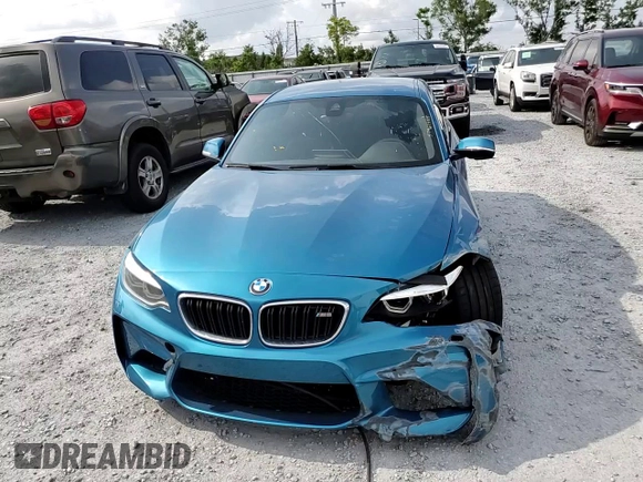 2018 BMW M2 z VIN WBS1J5C53JVD36649, wystawiony jako Copart lot #57961455 z przebiegiem 55 751 mil mil oraz Szkoda całkowita • Salvage title. Historia ofert i sprzedaży dostępna na DreamBid. Obrazek 13.