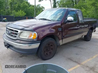 2000 Ford F-150 z VIN 1FTPX17LXYNA52377, wystawiony jako IAAI lot #42265332 z przebiegiem 220 971 mil mil oraz . Historia ofert i sprzedaży dostępna na DreamBid. Obrazek 2.