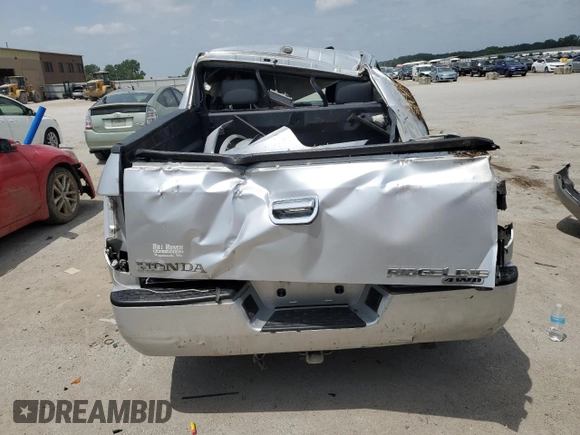 2007 Honda Ridgeline RTL with VIN 2HJYK16547H533699, listed as a Copart auction lot 61100115 with 241,366 mi miles and Salvage title. Bid and sale history available at DreamBid. Image 6.