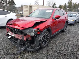 2023 Mazda CX-5 2.5 S Premium Package with VIN JM3KFBDM1P0161605, listed as a IAAI auction lot 41626777 with 26,581 mi miles. Bid and sale history available at carsss.com. Image 19.