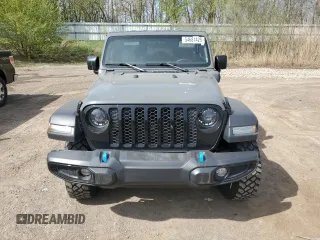 2023 Jeep Wrangler z VIN 1C4JJXN61PW623013, wystawiony jako Copart lot #54681425 z przebiegiem 26 574 mil mil oraz Czysty tytuł • Clean title. Historia ofert i sprzedaży dostępna na DreamBid. Obrazek 5.