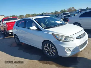 2015 Hyundai Accent Sport with VIN KMHCU5AE9FU205662, listed as a IAAI auction lot 41384496 with 80,133 mi miles. Bid and sale history available at carsss.com. Image 1.