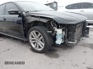 2019 Volkswagen Passat 2.0T Wolfsburg Edition with VIN 1VWLA7A36KC007173, listed as a IAAI auction lot 41357381 with 79,356 mi miles. Bid and sale history available at carsss.com. Image 19.