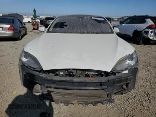2013 Tesla Model S Performance z VIN 5YJSA1DP1DFP20689, wystawiony jako Copart lot #63685765 z przebiegiem 218 610 mil mil oraz Szkoda całkowita • Salvage title. Historia ofert i sprzedaży dostępna na DreamBid. Obrazek 5.