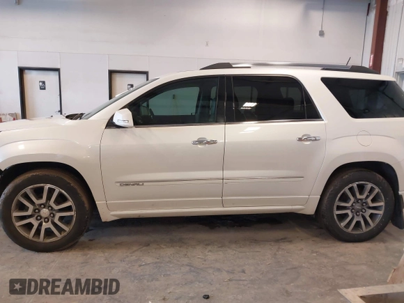 2014 GMC Acadia Denali with VIN 1GKKVTKD1EJ351419, listed as a IAAI auction lot 41728881 with 245,672 mi miles and . Bid and sale history available at carsss.com. Image 15.