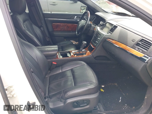 2013 Lincoln MKS EcoBoost with VIN 1LNHL9FT4DG604661, listed as a IAAI auction lot 42211781 with 134,902 mi miles and . Bid and sale history available at DreamBid. Image 5.