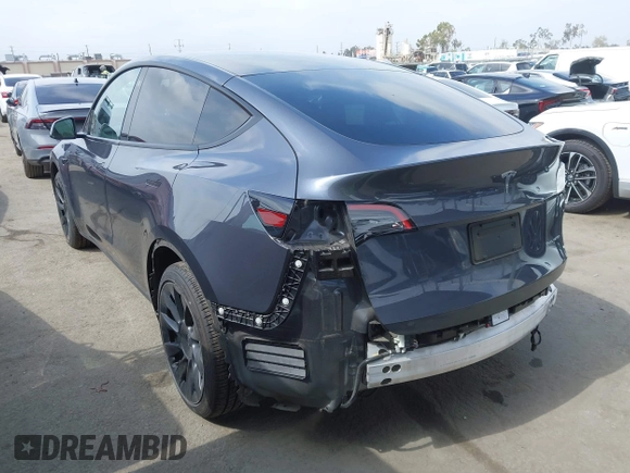 2022 Tesla Model Y Long Range z VIN 7SAYGDEE6NF364994, wystawiony jako IAAI lot #42322587 z przebiegiem 41 572 mil mil oraz . Historia ofert i sprzedaży dostępna na DreamBid. Obrazek 3.