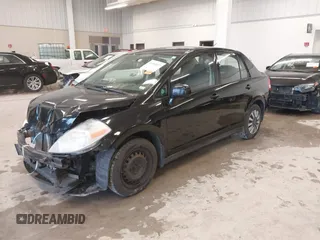 2009 Nissan Versa 1.8 S with VIN 3N1BC11E99L438342, listed as a IAAI auction lot 41561812 with 152,141 mi miles. Bid and sale history available at carsss.com. Image 20.
