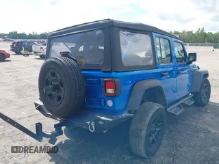 2022 Jeep Wrangler Unlimited Sport with VIN 1C4HJXDG3NW117155, listed as a IAAI auction lot 40240879 with 36,323 mi miles and . Bid and sale history available at DreamBid. Image 4.