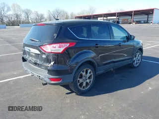 2013 Ford Escape SEL with VIN 1FMCU9H95DUA46183, listed as a IAAI auction lot 41903684 with 243,026 mi miles. Bid and sale history available at carsss.com. Image 4.