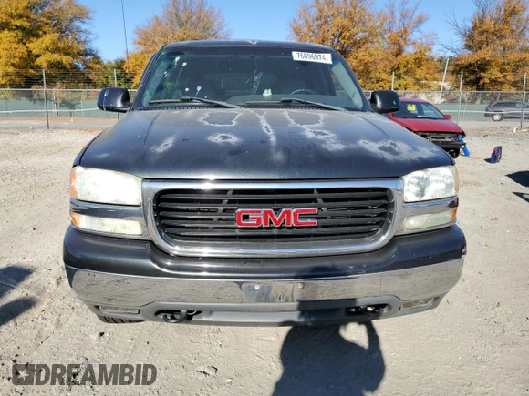 2004 GMC Yukon SLE with VIN 1GKEK13V24J236327, listed as a Copart auction lot 76896974 with 151,028 mi miles and Salvage Title. Bid and sale history available at carsss.com. Image 5.