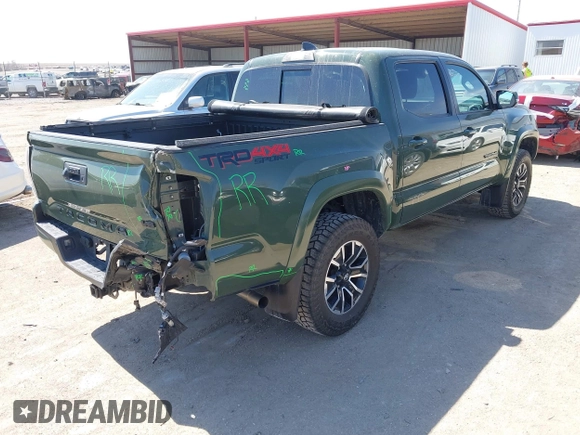 2022 Toyota Tacoma SR with VIN 3TMCZ5AN0NM470396, listed as a IAAI auction lot 41909515 with 35,997 mi miles and . Bid and sale history available at DreamBid. Image 4.
