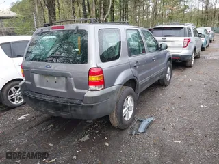 2007 Ford Escape XLS with VIN 1FMYU92Z37KB16651, listed as a IAAI auction lot 41986040 with 119,286 mi miles. Bid and sale history available at carsss.com. Image 4.
