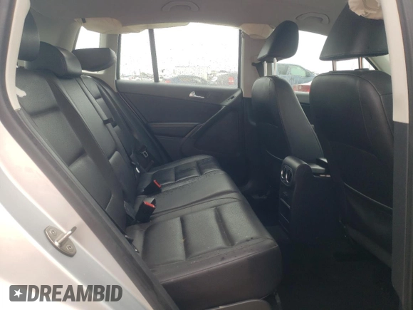2016 Volkswagen Tiguan S z VIN WVGAV7AX0GW521572, wystawiony jako Copart lot #55967235 z przebiegiem 143 113 mil mil oraz Szkoda całkowita • Salvage title. Historia ofert i sprzedaży dostępna na DreamBid. Obrazek 11.