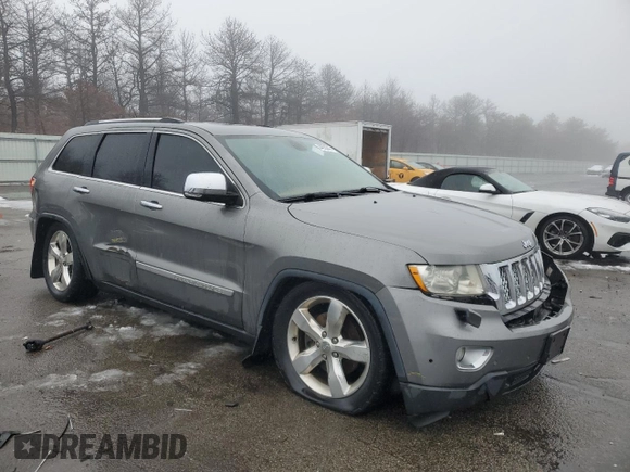 2013 Jeep Grand Cherokee Overland with VIN 1C4RJFCTXDC555233, listed as a Copart auction lot 44535045 with 104,721 mi miles and Clean Title. Bid and sale history available at carsss.com. Image 4.