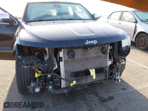 2014 Jeep Grand Cherokee Overland with VIN 1C4RJFCT5EC221015, listed as a IAAI auction lot 41959844 with 78,367 mi miles and . Bid and sale history available at DreamBid. Image 6.