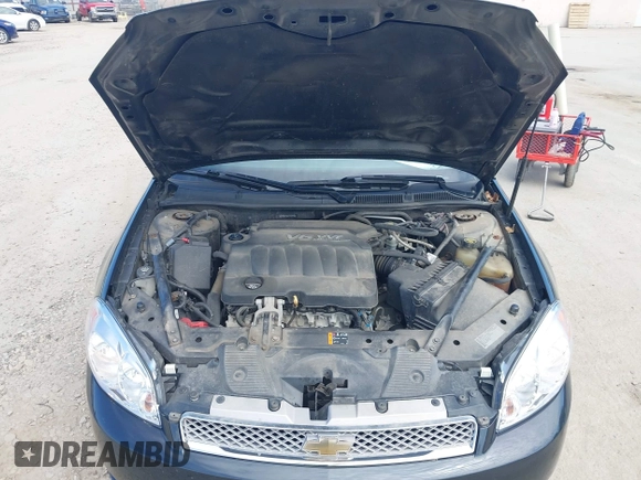 2012 Chevrolet Impala LS Retail with VIN 2G1WA5E36C1234992, listed as a IAAI auction lot 42094459 with 105,327 mi miles and . Bid and sale history available at DreamBid. Image 10.