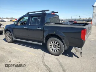 2011 Nissan Frontier Pro-4X with VIN 1N6AD0EV3BC437910, listed as a Copart auction lot 50757705 with 130,477 mi miles and Salvage title. Bid and sale history available at DreamBid. Image 2.