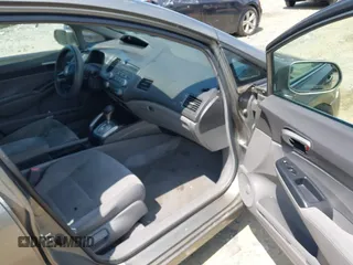 2006 Honda Civic LX with VIN 1HGFA16596L116774, listed as a IAAI auction lot 42674620 with 258,067 mi miles and . Bid and sale history available at DreamBid. Image 5.