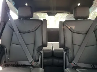 2025 Cadillac XT6 AWD Premium Luxury z VIN 1GYKPDRS1SZ128403, wystawiony jako Copart lot #58776065 z przebiegiem 121 mil mil oraz Czysty tytuł • Clean title. Historia ofert i sprzedaży dostępna na DreamBid. Obrazek 10.