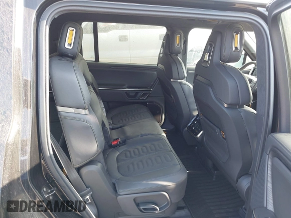 2023 Rivian R1S Adventure z VIN 7PDSGABA8PN020504, wystawiony jako IAAI lot #42025341 z przebiegiem 5989 mil mil oraz . Historia ofert i sprzedaży dostępna na DreamBid. Obrazek 8.