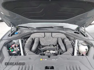 2023 Genesis GV70 Sport with VIN KMUMCDTC1PU098851, listed as a IAAI auction lot 41864774 with 15,016 mi miles and . Bid and sale history available at DreamBid. Image 10.