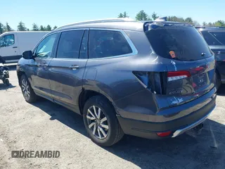 2021 Honda Pilot EX-L with VIN 5FNYF6H59MB016354, listed as a IAAI auction lot 42108020 with 61,436 mi miles and . Bid and sale history available at DreamBid. Image 3.