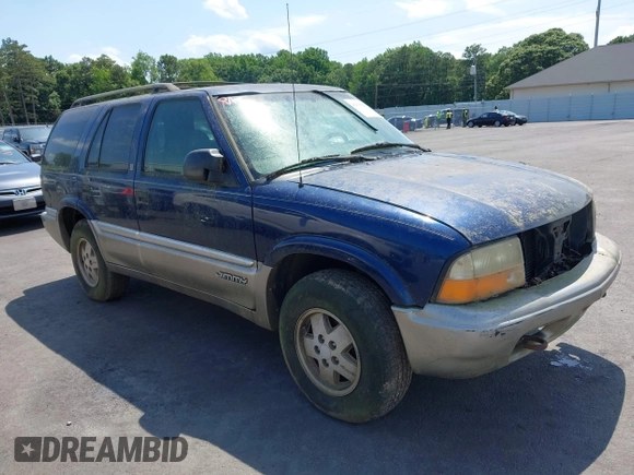 2001 GMC Jimmy SLE z VIN 1GKDT13W612136433, wystawiony jako IAAI lot #42336277 z przebiegiem Nie podano mil oraz . Historia ofert i sprzedaży dostępna na DreamBid. Obrazek 1.