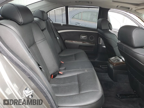 2007 BMW 7 Series 750i with VIN WBAHL83527DT09744, listed as a Copart auction lot 62309195 with 118,242 mi miles and Salvage title. Bid and sale history available at DreamBid. Image 10.